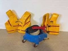Bucket dolly, (2) life jackets, and string
