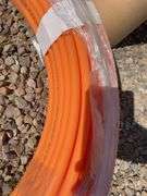 Metal drum, Pex tubing, vacuum hose and Fuller Brikarier brick carrier