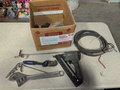 Nail gun, 18" adjustable wrench, and other tools