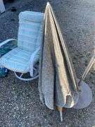 Umbrella stand w/ umbrella, outdoor chair and extra cushion