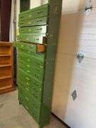 Green organizational stand - 32" wide, 8" deep, and 84" tall