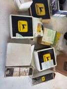 Tote of filters, parts, and more - John Deere, Wix, etc