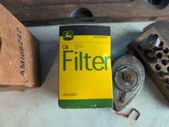 Tote with various tools - extension cord, level, bits, saw, and more