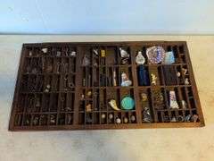 Shadow box with various vintage items - glass figurines, keys, pins, and more