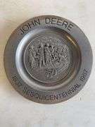 John Deere plate, die-cast model car, and International model tractor