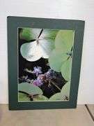 Vases with silk flowers, cups, and more