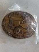 (4) John Deere belt buckles