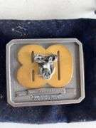 (4) John Deere belt buckles