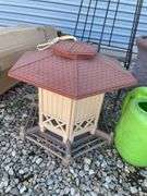 Assortment of Planters, sprayer, bird house, decorative stand and watering can