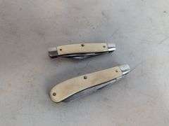 (2) Frontier pocket knives