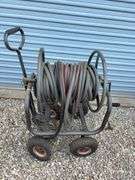 Garden hose with cart - most wheels are flat