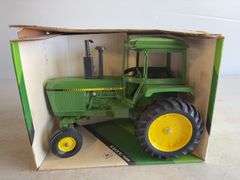 John Deere sound-gard diecast model tractor - 1/16 scale, dirty