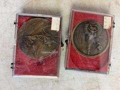 (6) John Deere belt buckles and (2) holiday coins