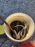 Cutler-Hammer electric boxes, Blitz oil drain, cone, buckets with jumper cables