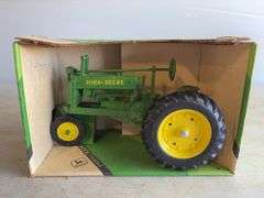 John Deere 1934 Model A diecast model tractor - 1/16 scale, dirty