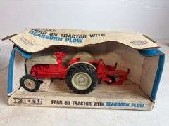 Ford 8N die-cast model tractor with Dearborn plow and other Ford tractor - 1/16 scale, dirty