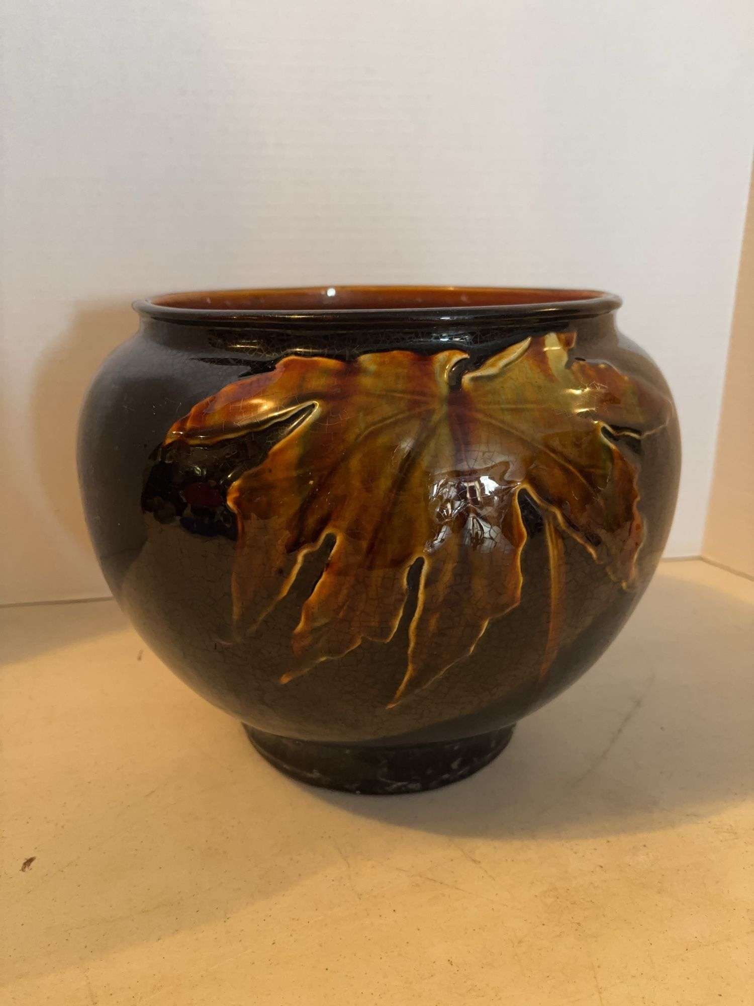 WELLER POTTERY BROWN GLAZE WITH LEAF 10” x 9”