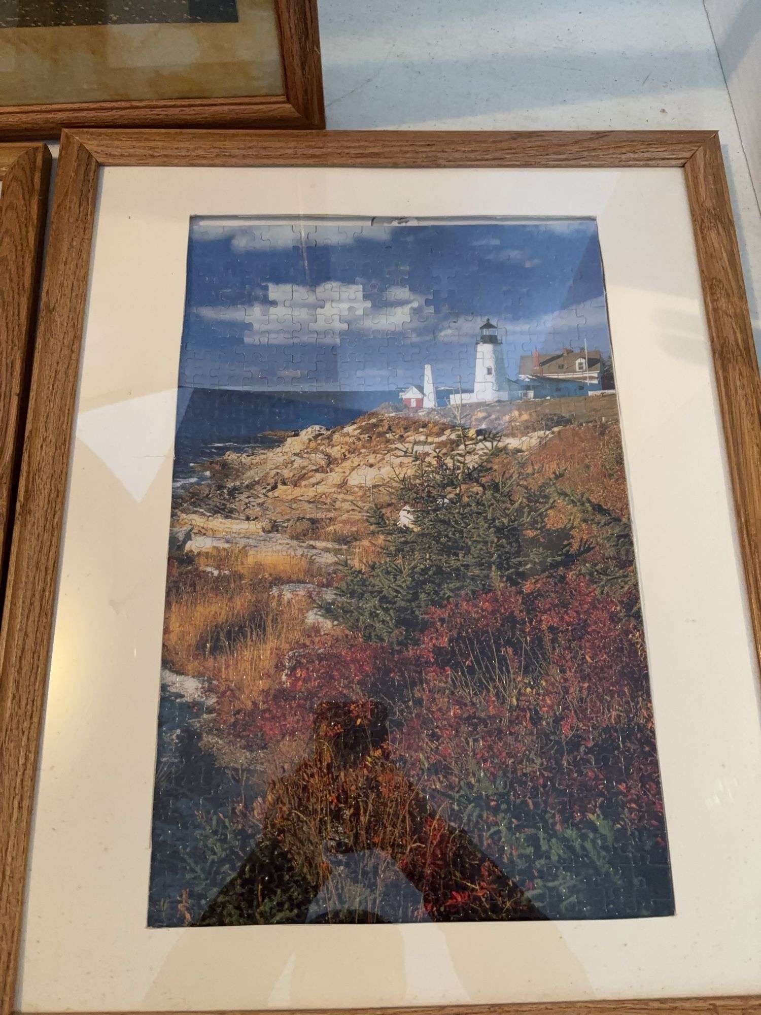 3 FRAMED LIGHT HOUSE PUZZLES 22” x 17.5”