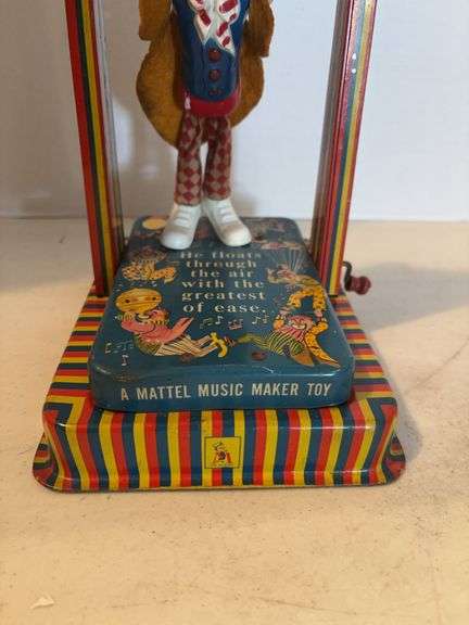 TIN WITH MATTEL MUSIC TOY WITH CLOWN 11”