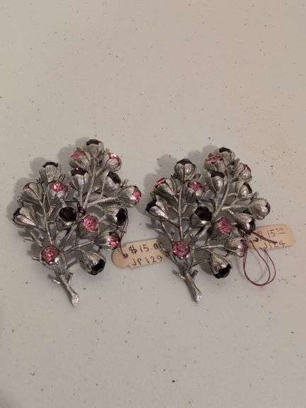 (2) Sarah Coventry brooches with pink and purple rhinestones