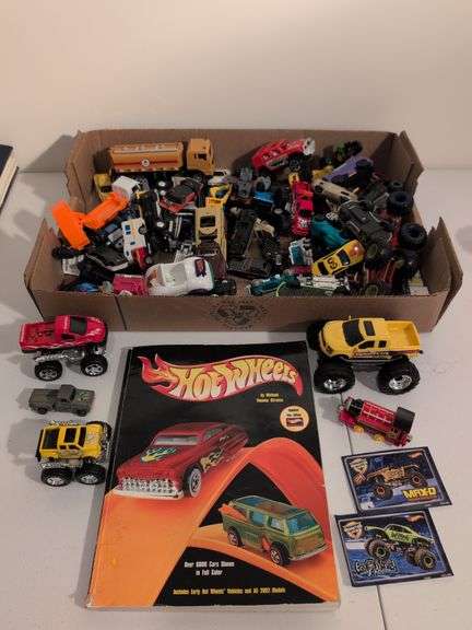 Assortment of toy vehicles - some Hot Wheels and Hot Wheels book