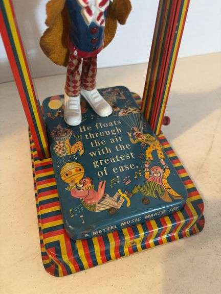 TIN WITH MATTEL MUSIC TOY WITH CLOWN 11”