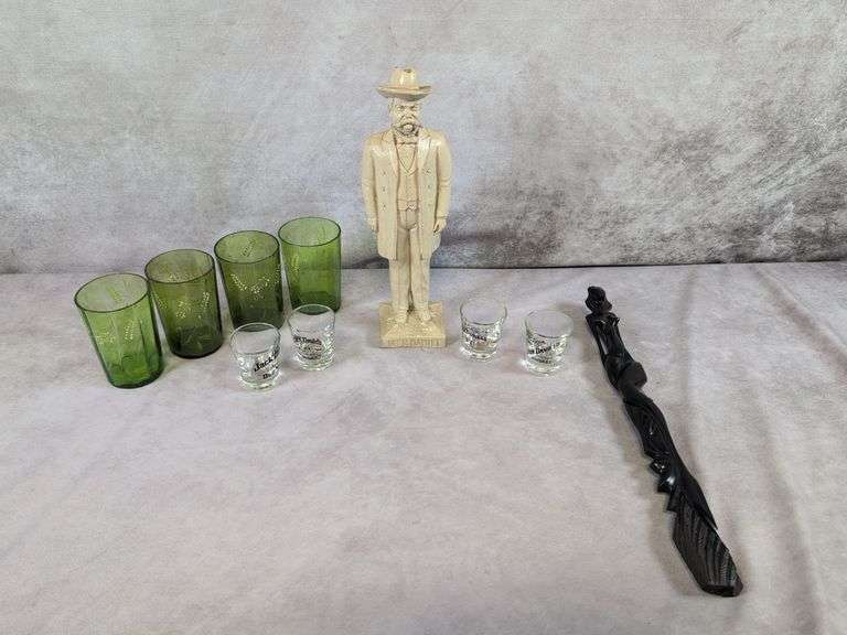 Jack Daniel figurine, shot glasses, (4) matching glass drinking cups, and lady figurine