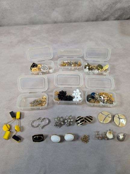 Assortment of costume jewelry - mostly earrings and decorative pins