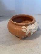 WELLER POTTERY PEACH WITH WHITE FLOWER DESIGN 4”