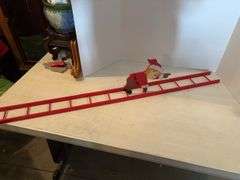 47” ELF CLIMBING A LADDER