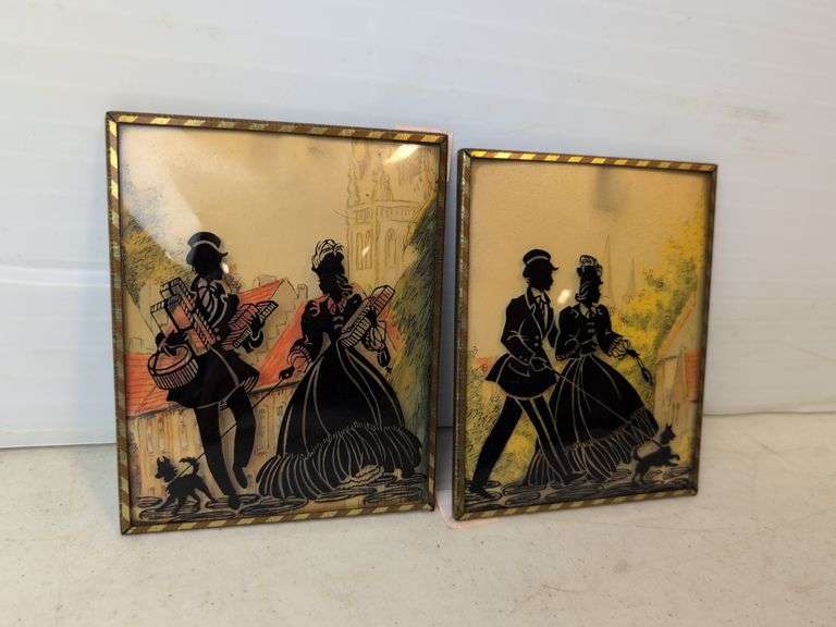 pair of Silhouette pictures on bubble shape glass frames