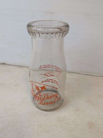 Driggs Dairy Farms Inc. milk bottle orange lettering founded 1908 in Michigan then expanded 1930's  