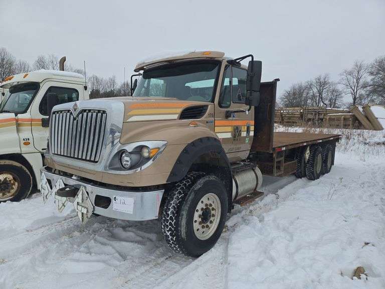2013 International 7600 SBA Flatbed Truck showing 103,284 mi, 4,928 hrs - runs
