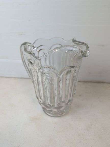 early heavy water pitcher floral/zipper pattern apprx 8" high