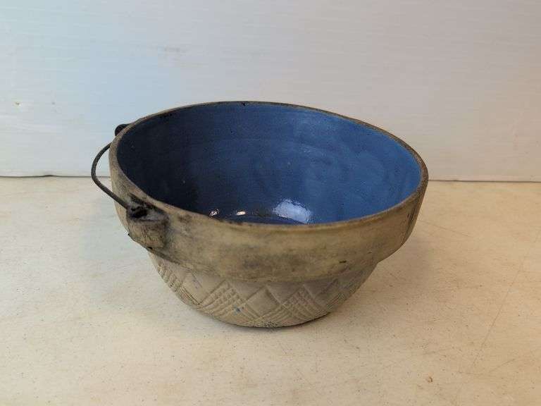 "The German" crock bowl bottom star motif painted blue inside with wire hande approx 9" wide Nice