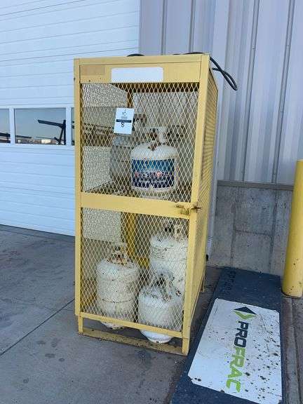 Metal cage w/ tanks