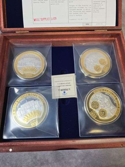 SET OF 4 HISTORY OF GOLD MEDALLIONS IN CASE