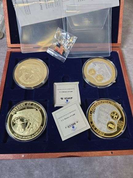 SET OF 4 HISTORY OF GOLD MEDALLIONS IN CASE