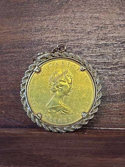 1984 CANADIAN 1-OZ. GOLD MAPLE LEAF IN BEZEL
