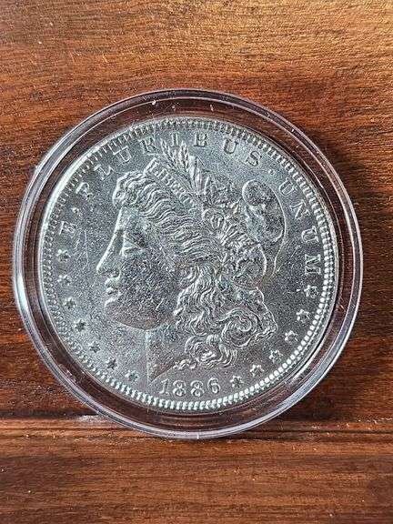 1886 MORGAN DOLLAR AU